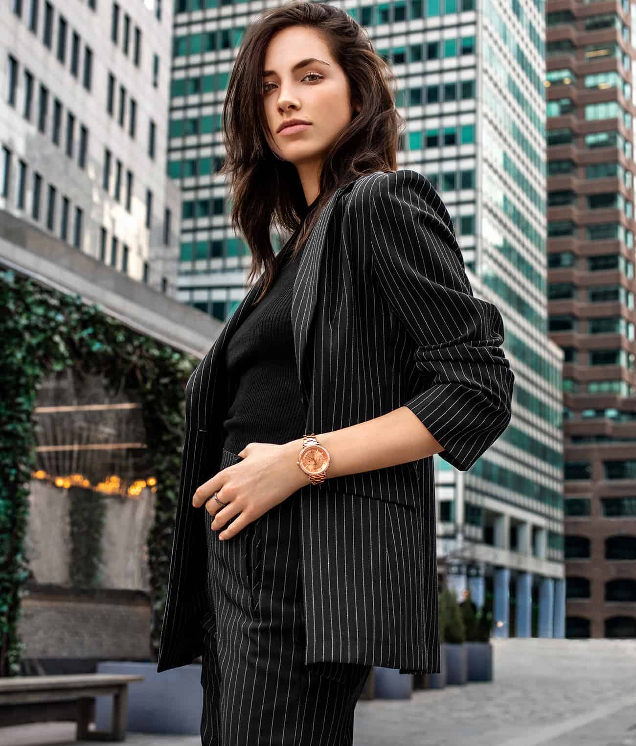 woman in a suit wearing a stührling watch